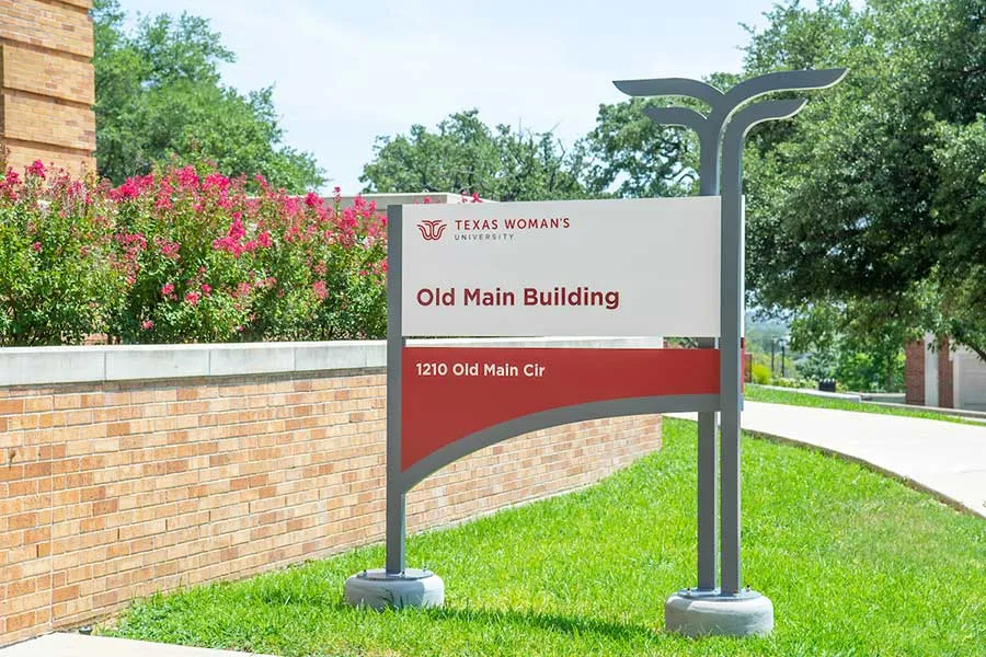 TWU Old Main Building exterior with sign