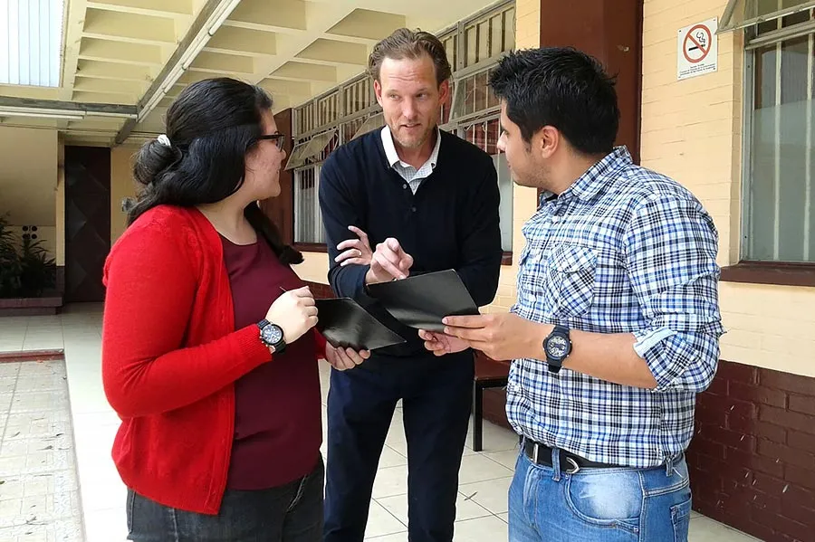 A TWU faculty member mentoring students in Guatemala