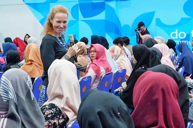 A Fulbright instructor lectures to an all-female class in Indonesia