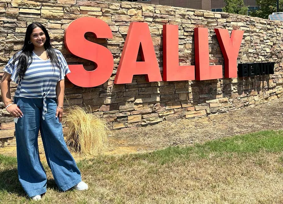 Shalini Shekar outside the Sally Beauty Company corporate offices