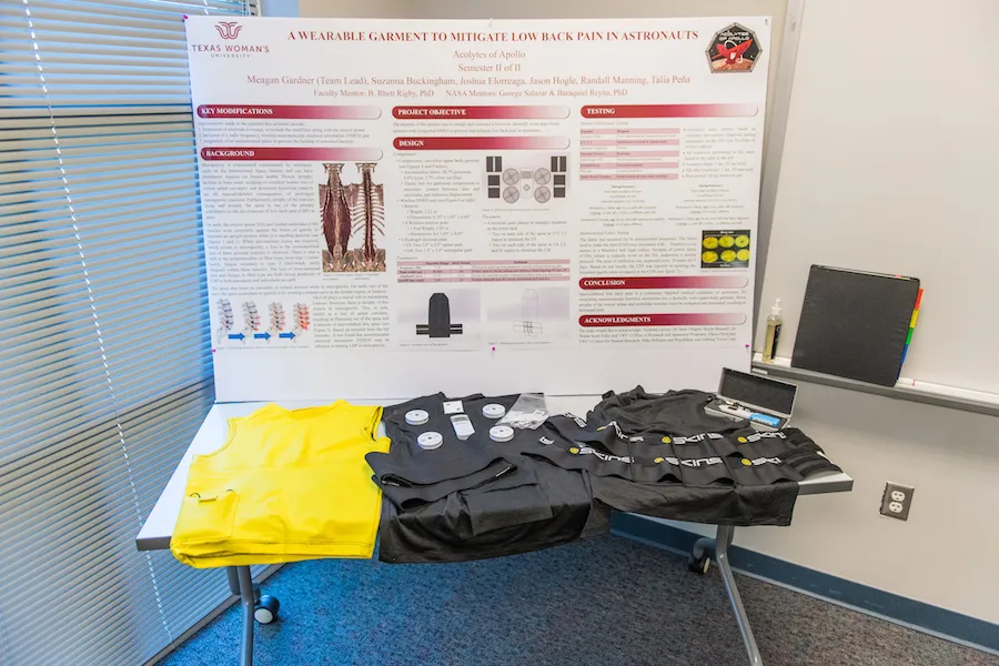 The TWU poster and garment prototypes presented at the spring Design Challenge for NASA.