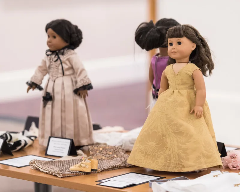 American Girl dolls dressed in First Ladies of Texas Historic gowns.