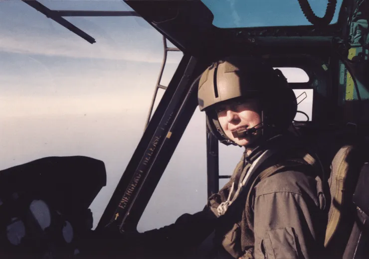 1LT Cheryl Pauley (WG #670) in a helicopter
