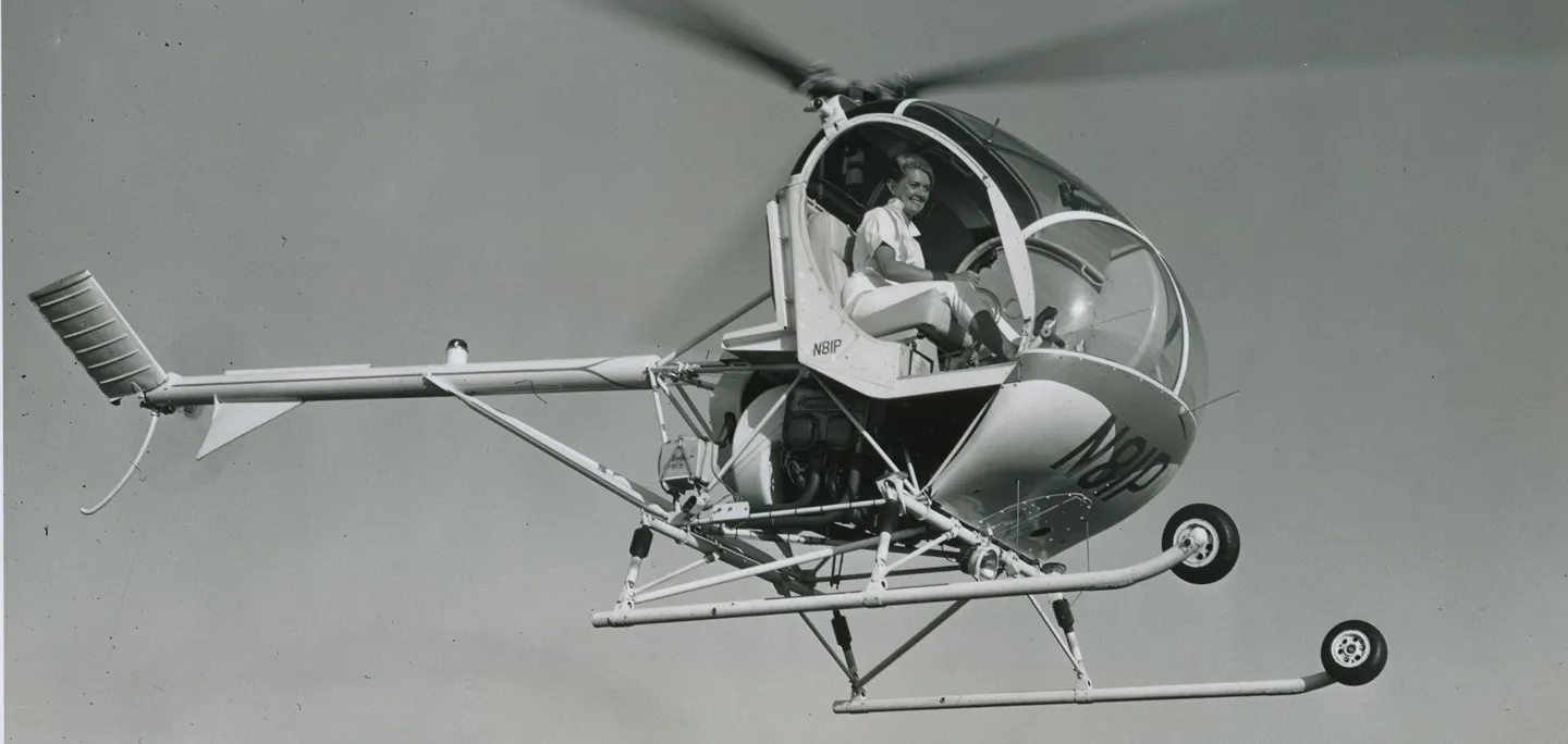 woman in helicopter