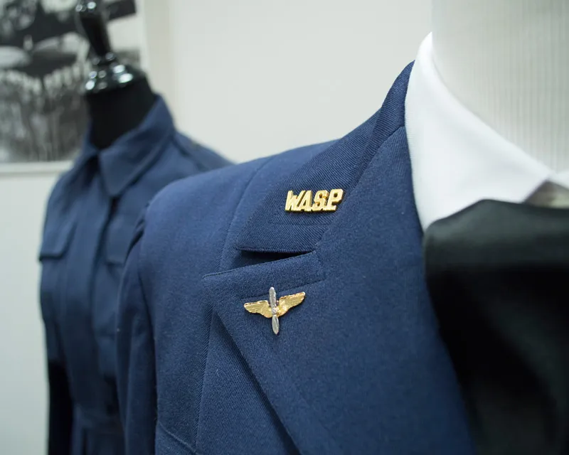 Two WASP uniforms on mannequins