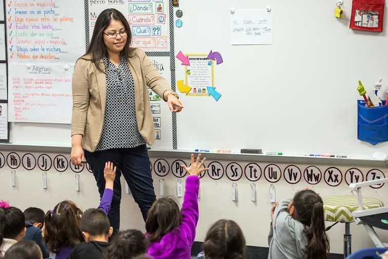Student teaches class of young children