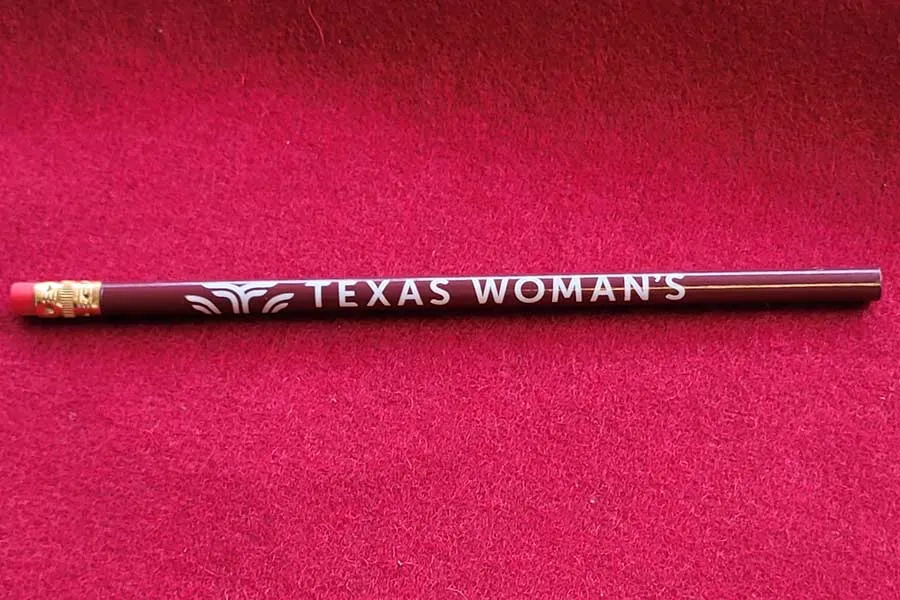 A pencil with the TWU logo on the side.