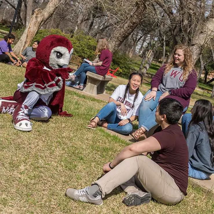 Students in the grass