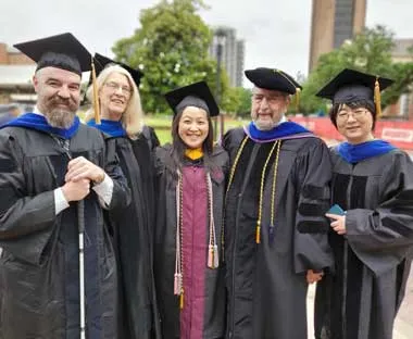  IT Project Analyst Quenna Ngo (center, MS Informatics '19) with Texas Woman's University Informatics Program faculty.