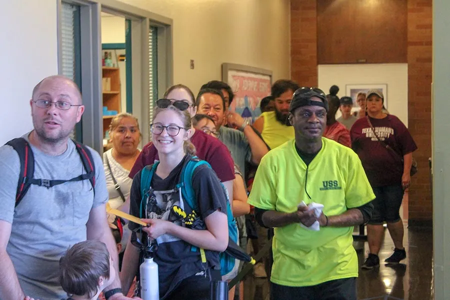 Students line up to take the elevators to their respective floors on move-in day 2019.