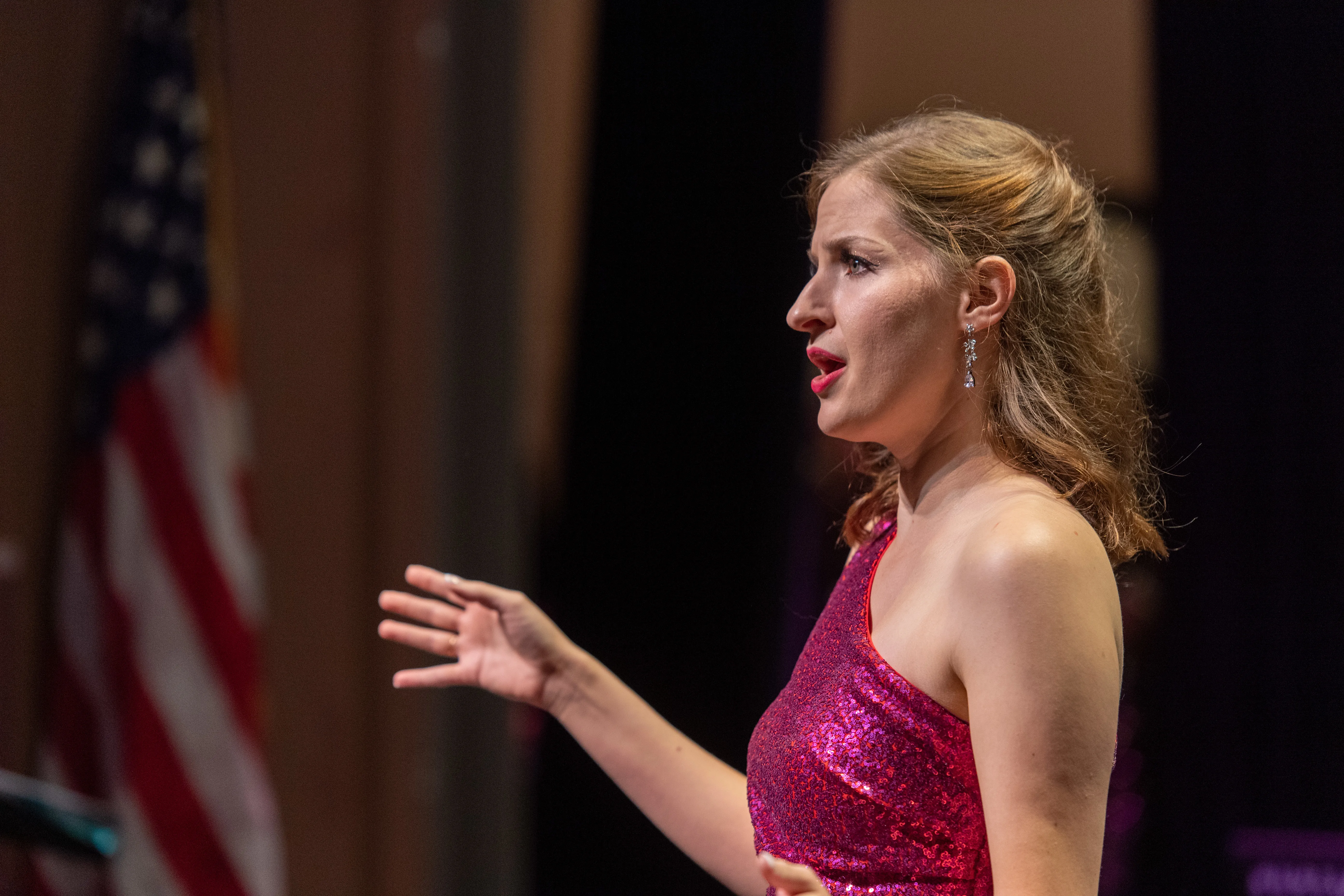 Student singer wearing a pink dress