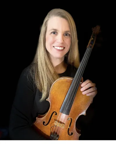 Gail Bowers holding a viola