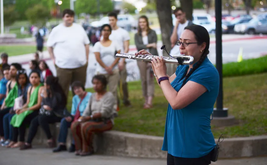 A music student performs in front of a live audience at TWU’s annual ArtsWalk. 