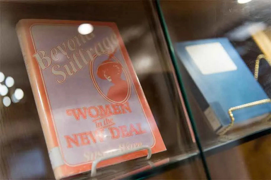 Close-up of a book titled 'Beyond Suffrage: Women of the New Deal'