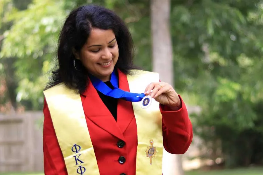 Anila Simon earns PhD with 4.0