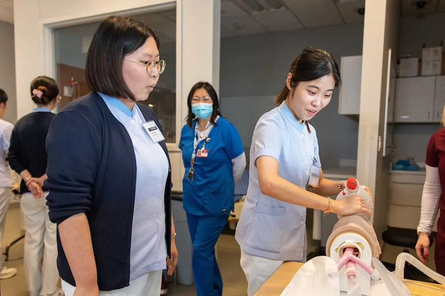 Korean nursing students do labs at the Global Nursing Program at TWU Dallas