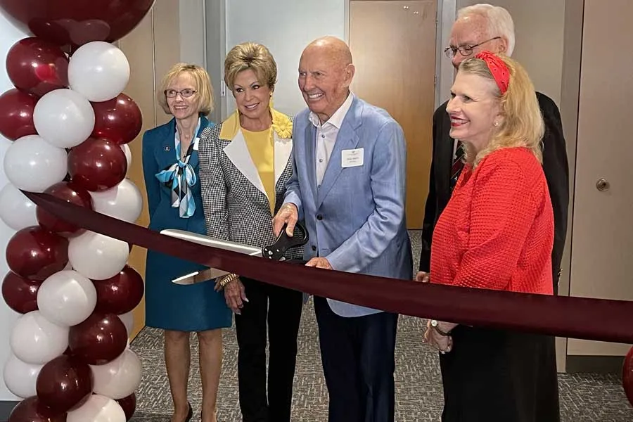 Mike A. Myers, JHG, and Dean Mainous cut the ribbon on the new academic support center