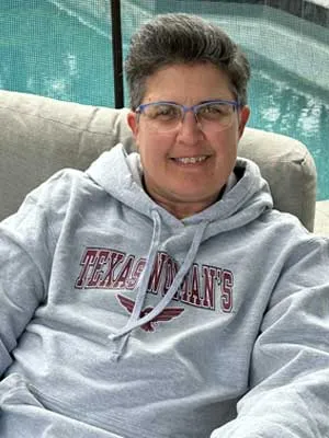 Tracy Tyner with a TWU hoodie