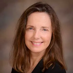 A headshot of Carolyn Moore.