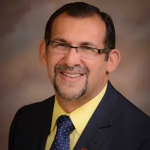 A portrait of Shanil Juma.