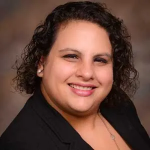 A headshot of Monique LeMieux.
