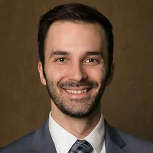 A headshot of Derek Miketinas.