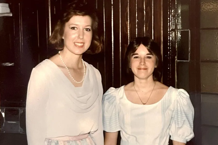 Lou Ann Hintz (on the left) stands with her best friend on the Dallas campus