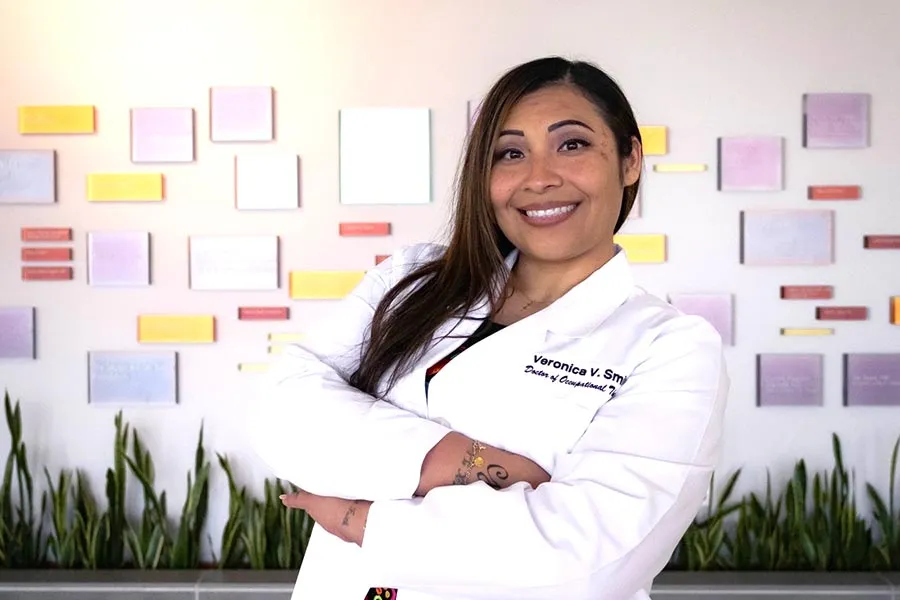 a profile picture of Veronica Villalobos Smith in a white coat