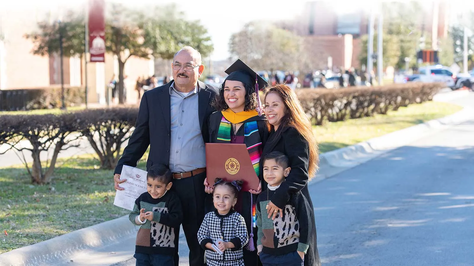 A family at TWU commencement