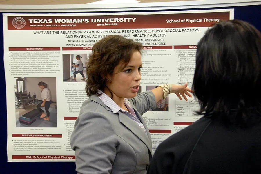 PT student shares her research poster with others 