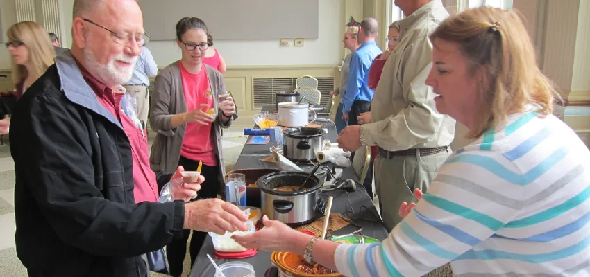 Faculty & Staff Serving Chili at SECC event 