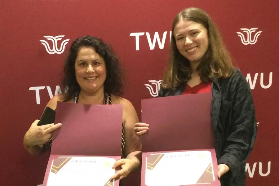 TWU students Catia Azevedo de Souza and Barbara Harbour accept GLISA scholarships