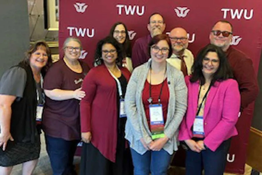 SLIS faculty and staff at TLA 2025