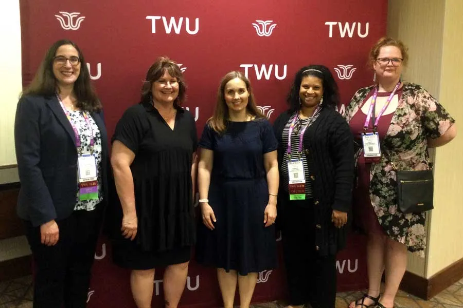 Hoffman and SLIS staff at TLA 2024