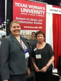 Two women standing in front of a banner that says Texas Woman's University. 
