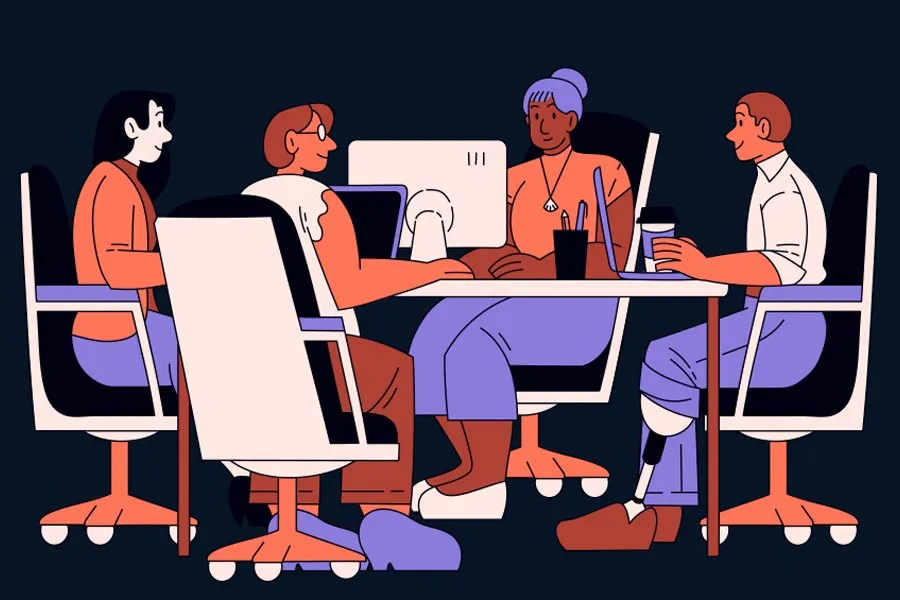 Four people sitting around a table 
