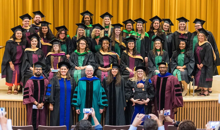 TWU-UNT JMSW Class of 2019 graduates and program faculty. 