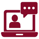 Maroon icon of a laptop displaying a person’s silhouette on the screen, with a speech bubble, representing an online meeting.