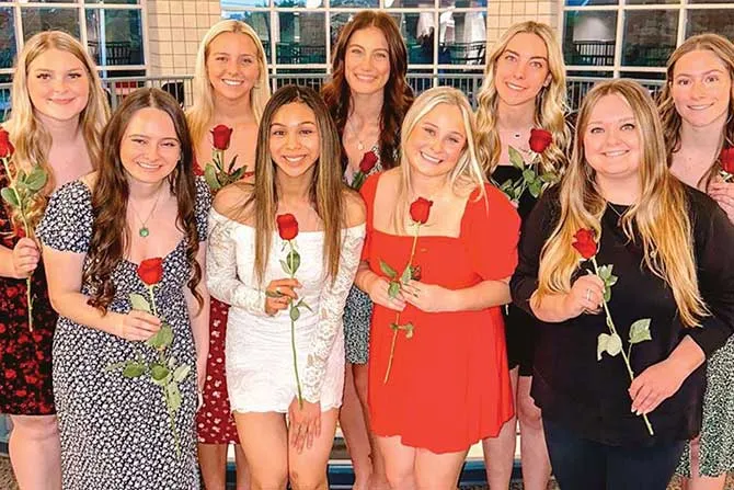 TWU sorority students posing with roses
