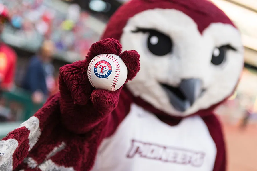 TWU mascot holding a Texas Rangers baseball
