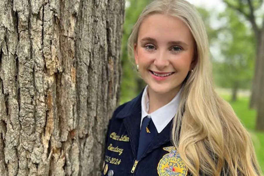 Portrait of TWU pre-nursing student Claire Butler in her FFA jacket