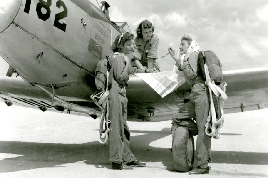 WASPs check their map prior to flight, Avenger Field, Sweetwater, Texas, August 1943.