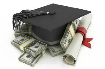 Graduation cap and diploma on sets of bills.