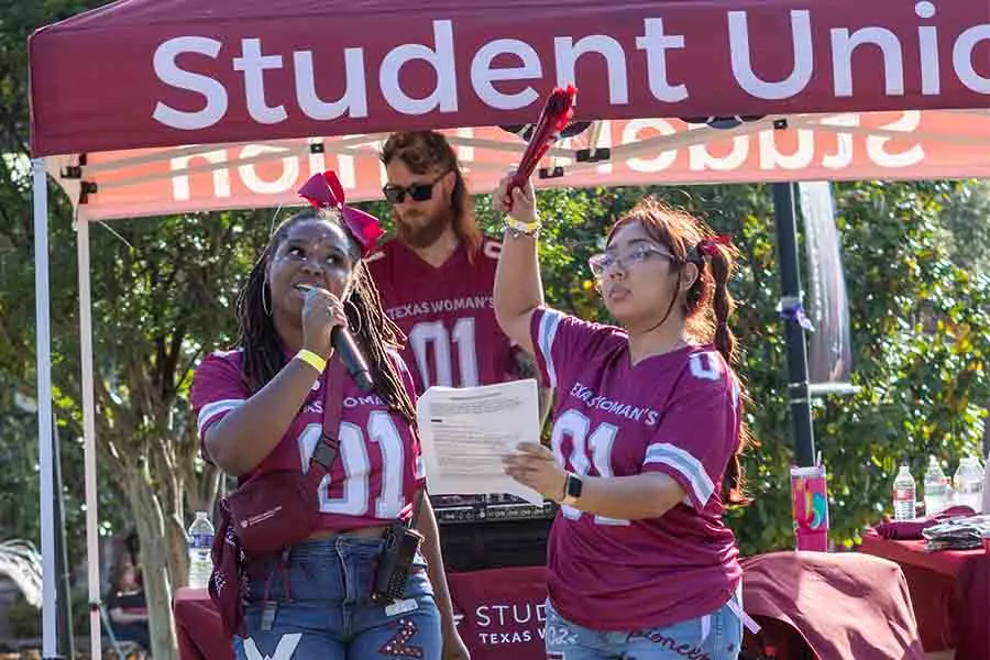 TWU students promoting SUP at Pioneer Palooza