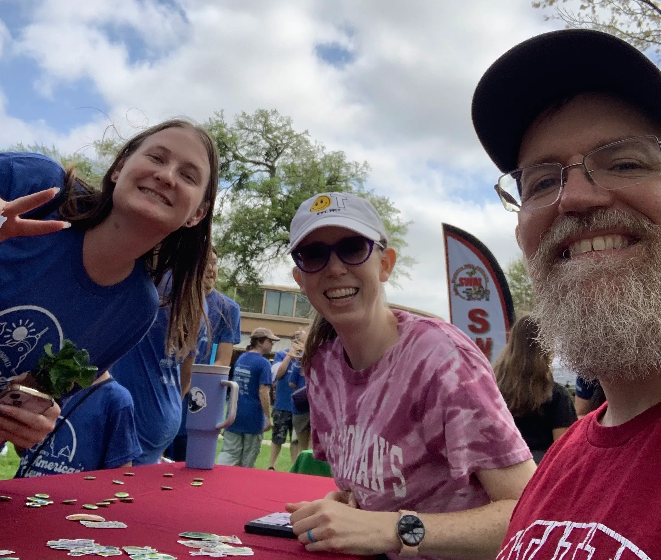 Sustainability committee members at a cleanup participant at the committee table