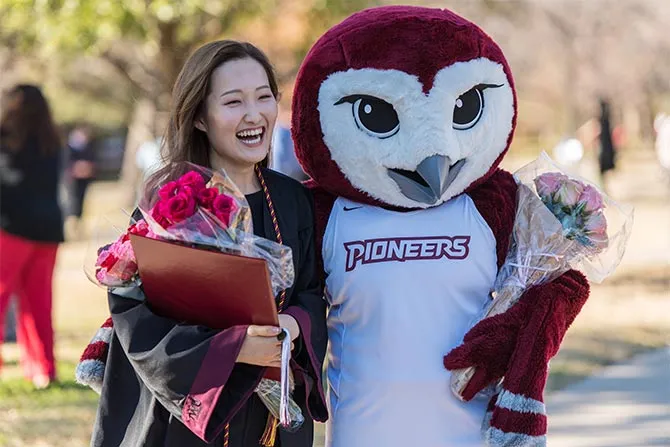 Graduating student with Oakley
