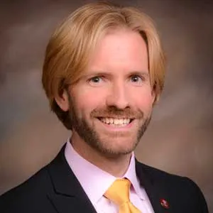 A portrait of Christopher Johnson.