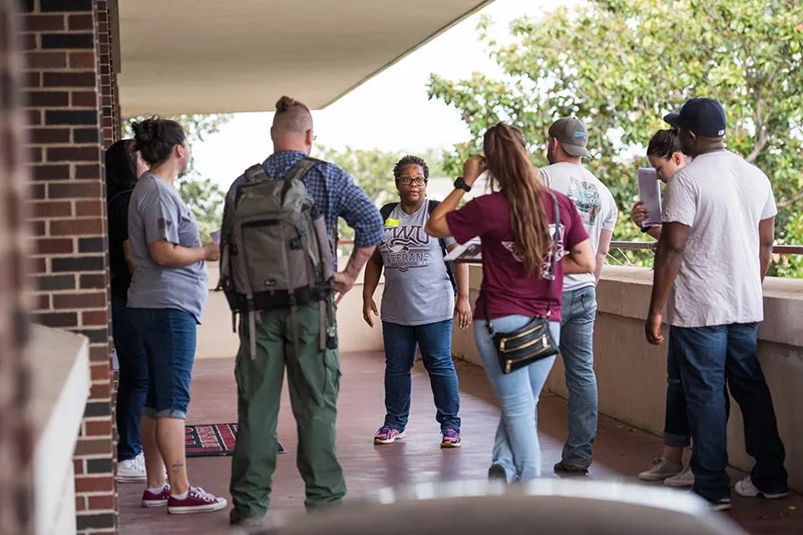 TWU Students standing outside of the Student Union 