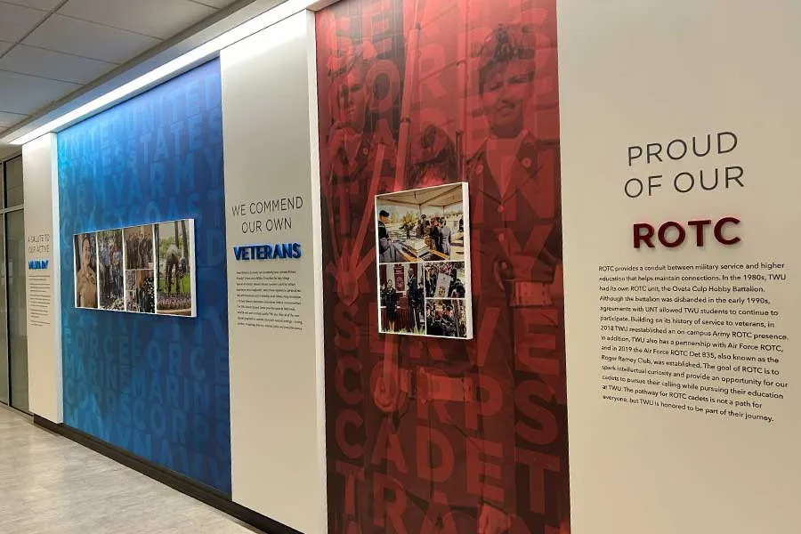 Image of the veteran/ROTC wall in SUHH near the Veterans Student Center 