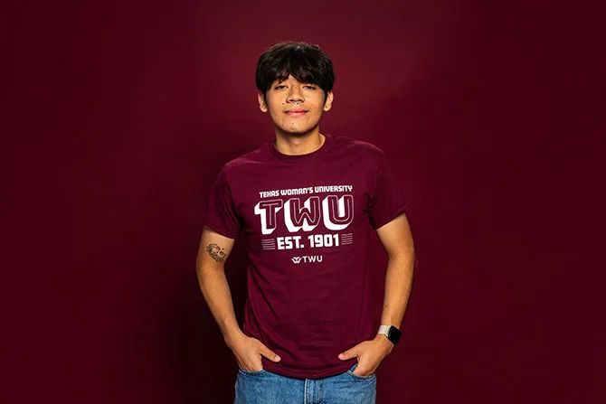A portrait of a TWU student on a maroon background